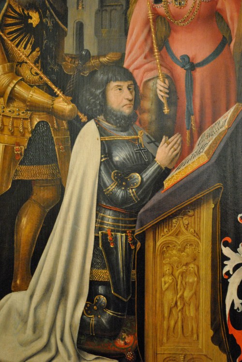 Cologne School- Virgin and Child with Saints. This is a close up of, most likely, the person who commissioned the painting. Which begs the question, seriously? They couldn't at least make him a tad more attractive?? 